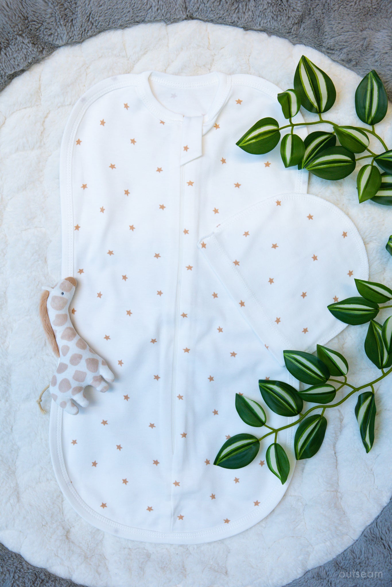 Outseam Newborn Sleep Cocoon - Brown Stars — soft cotton baby sleep cocoon with outward seams